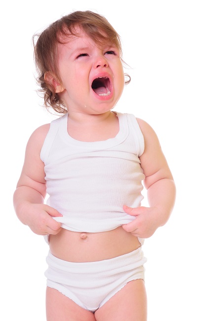 toddler crying in white tshirt