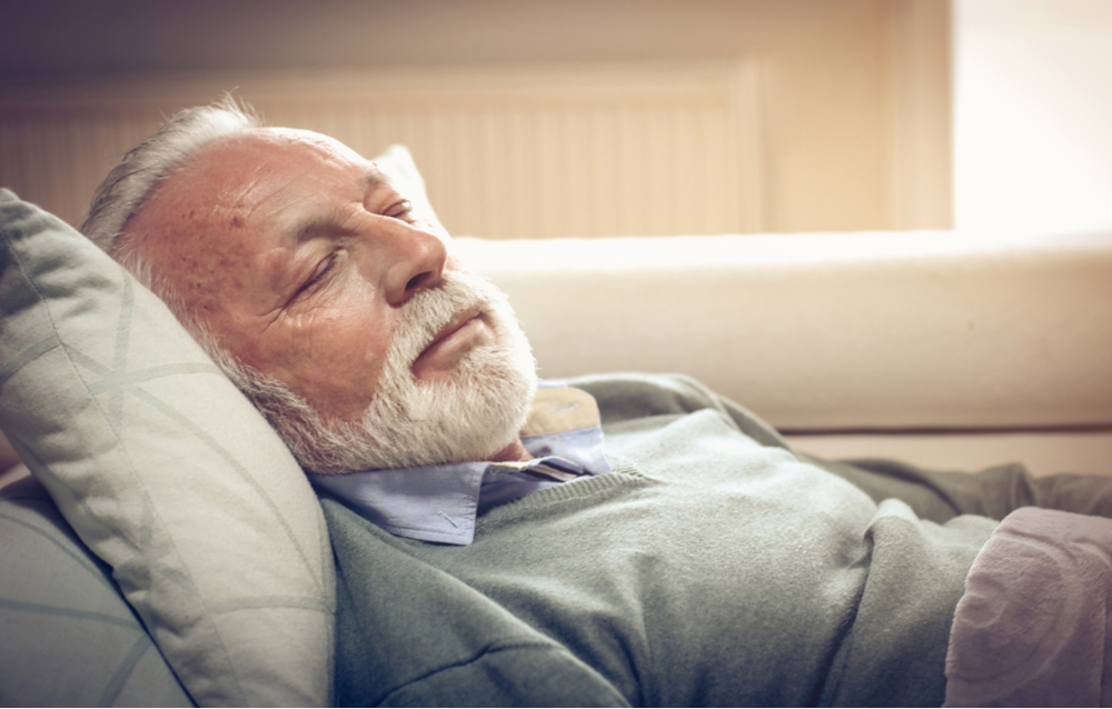 elderly man sleeping peacefully